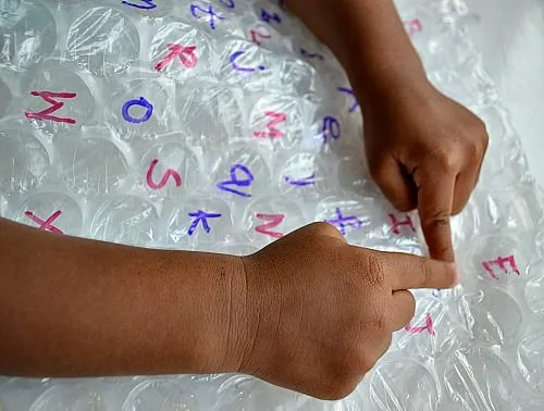 popping letter bubbles