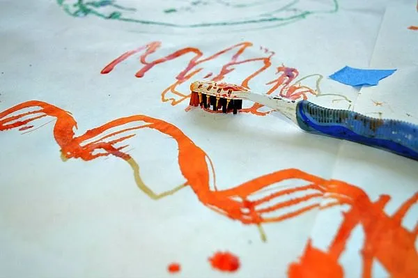painting with tooth brush