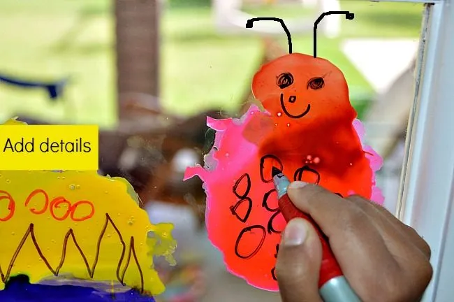 decorating spring window cling bee