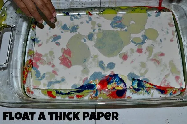 float a paper on oil paint water