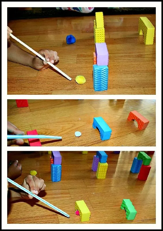 Blow Pom Poms Through Foam Buildings