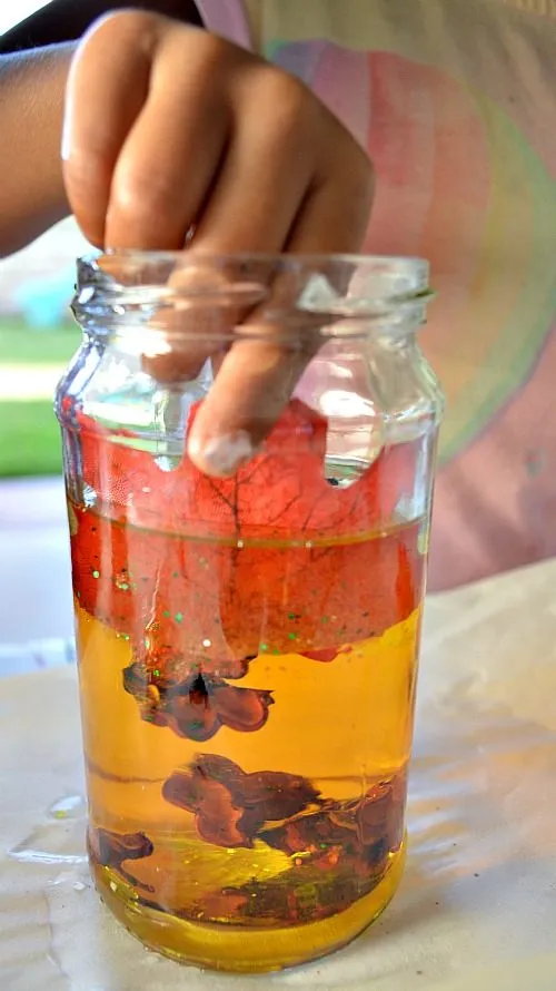adding leaves to fall jars