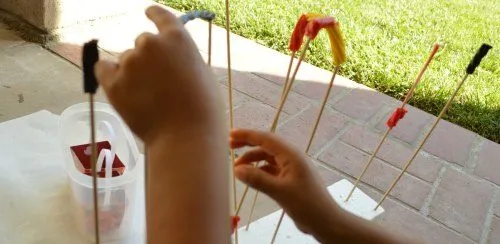 playing with twizzlers