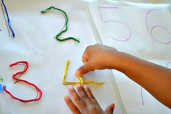 fine motor activity with yarn