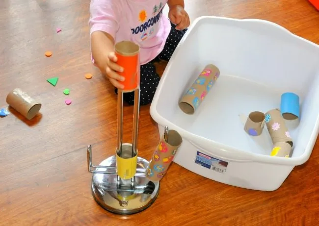 baby play with tp rolls