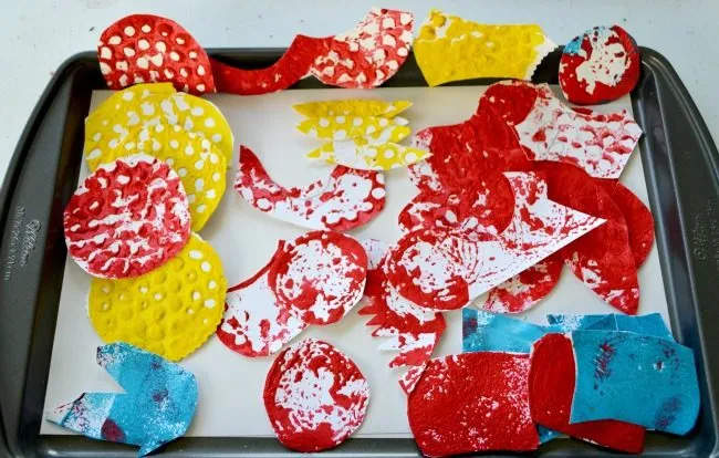 cutting painted paper