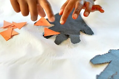 sticking the nails on halloween crafts