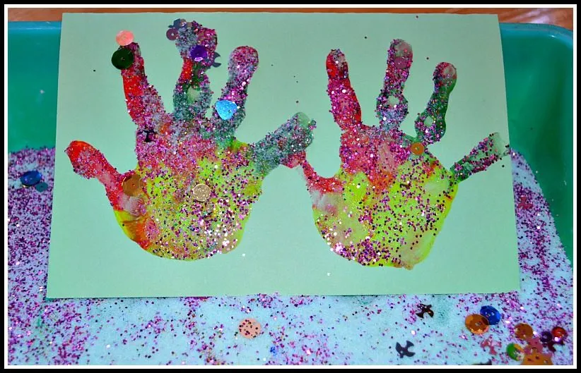 rainbow hand prints with salt glitter as christmas cards