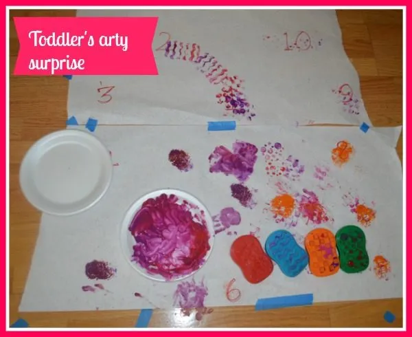 toddler painting hearts