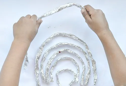 arranging the kids rainbow craft