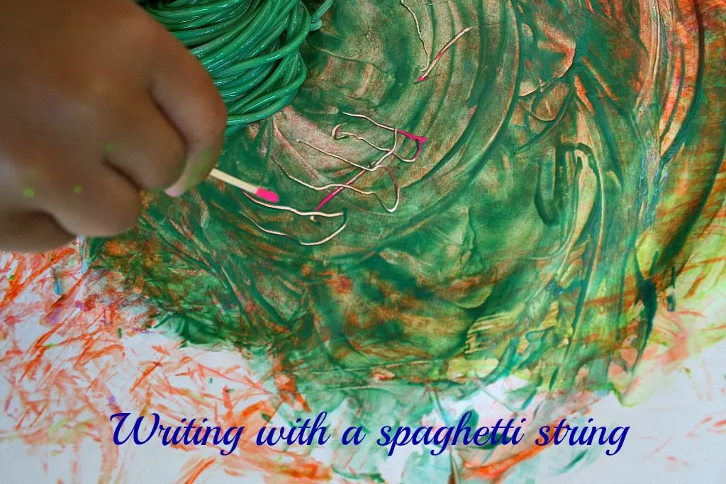 Paint with Spaghetti Brooms