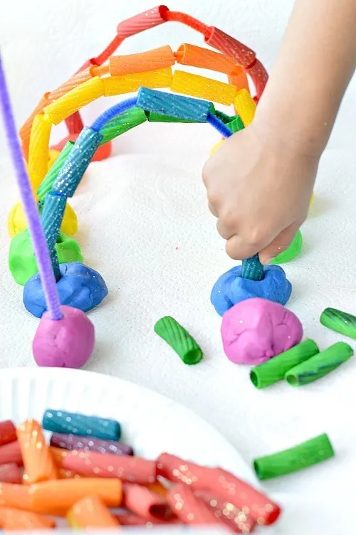 playing with rainbow pasta