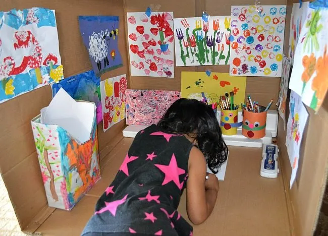 kids drawing in a box