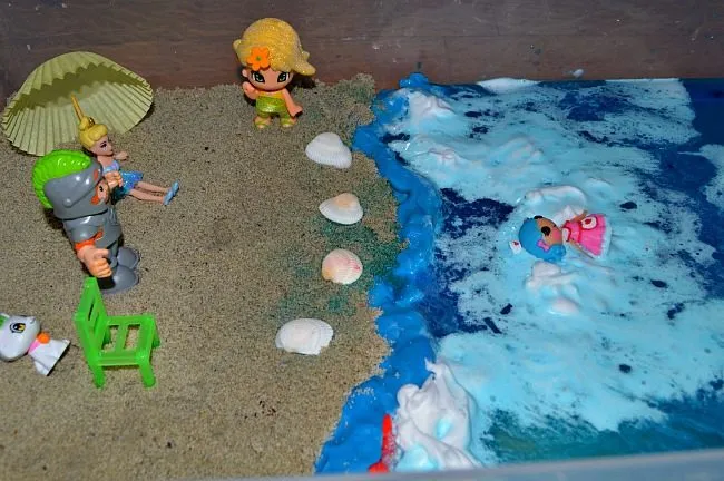 little people on the beach
