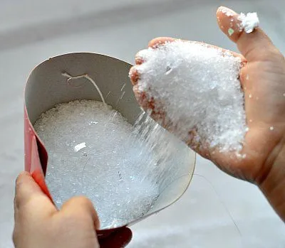 pouring sensory snow
