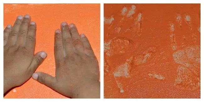 preschool writing with sensory paste and handprints