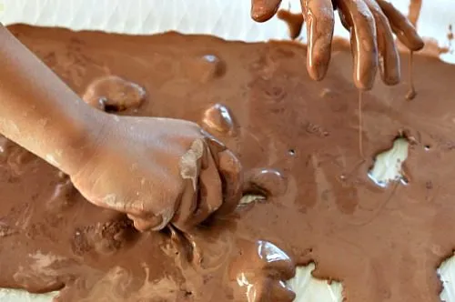 Valentines day sensory play brown goop